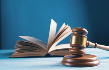 open-book-on-brown-wooden-table.jpg open book on brown wooden table